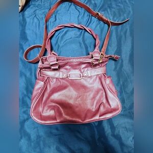 Purple crossbody purse.